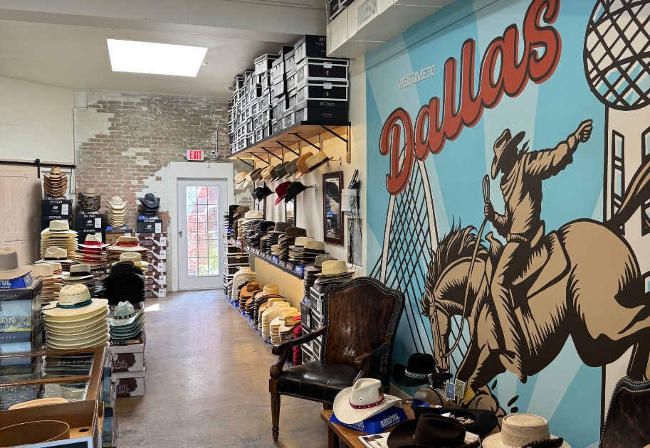 The McKinney Hat Company showroom on Henderson Avenue with Stetson display and Dallas mural